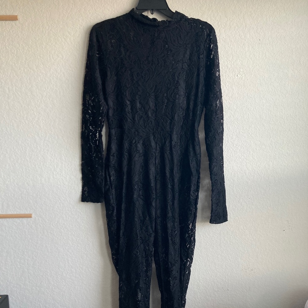 Missguided black lace catsuit. Size 10.